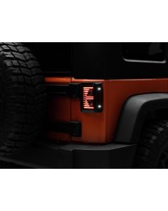 Raxiom 07-18 Jeep Wrangler JK Axial Series Vision LED Tail Lights- Black Housing (Smoked Lens) - J130808