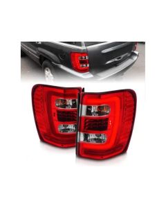 ANZO 1999-2004 Jeep Grand Cherokee LED Tail Lights w/ Light Bar Chrome Housing Red/Clear Lens - 311396